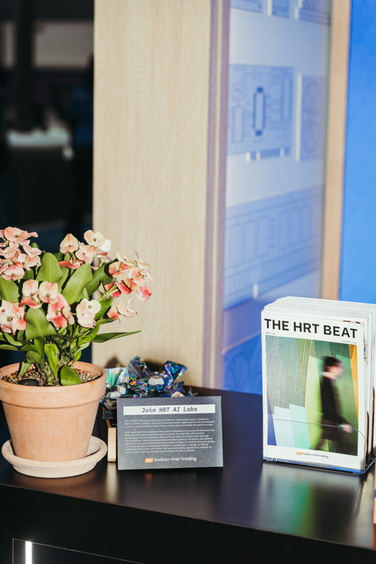 Floral arrangement and branded event materials displayed at a professional event in Korea