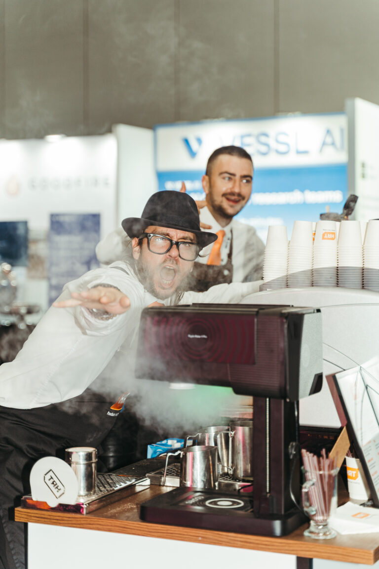 Staff preparing beverages at a branded corporate hospitality event in Korea