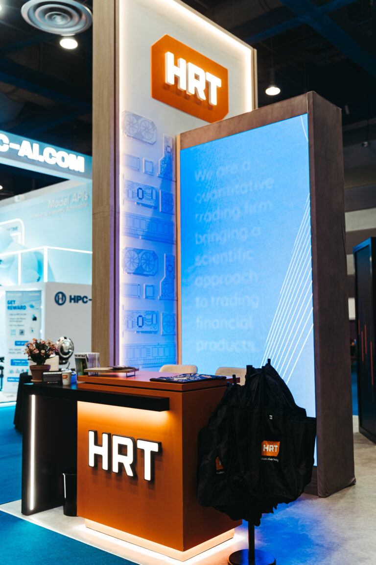 Branded exhibition booth and digital display photographed at a trade show in Korea