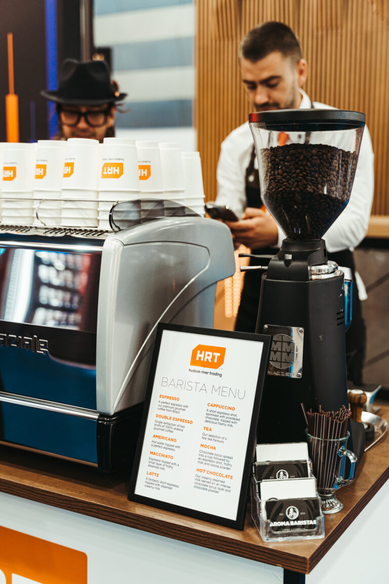 Professional coffee station and branded menu at a corporate event in Korea