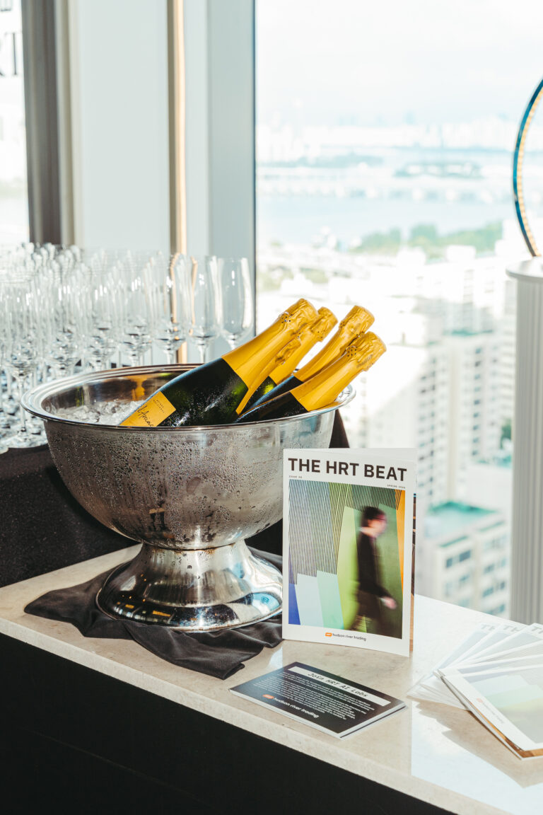 Champagne and branded event materials arranged for a professional reception in Korea