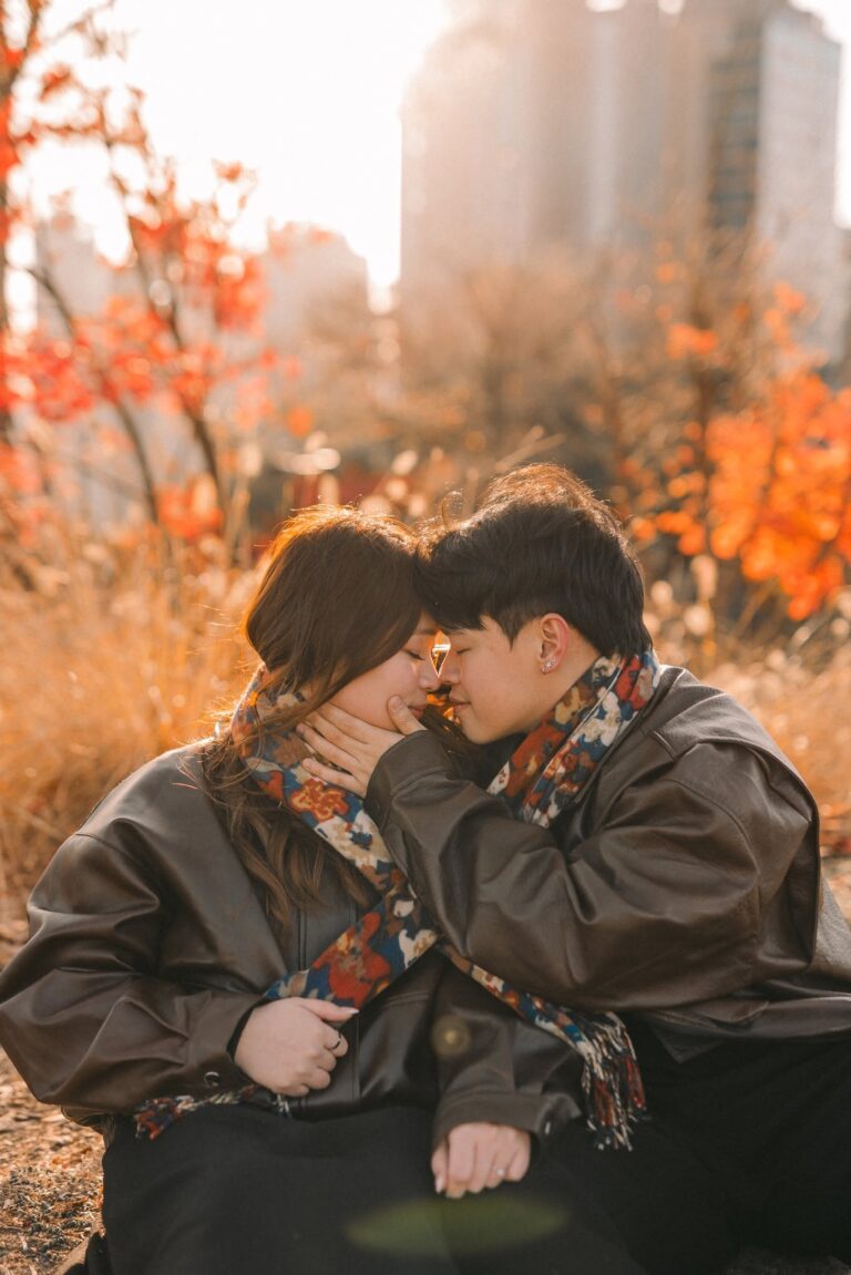 Romantic couple sharing a quiet moment during an autumn Seoul photoshoot