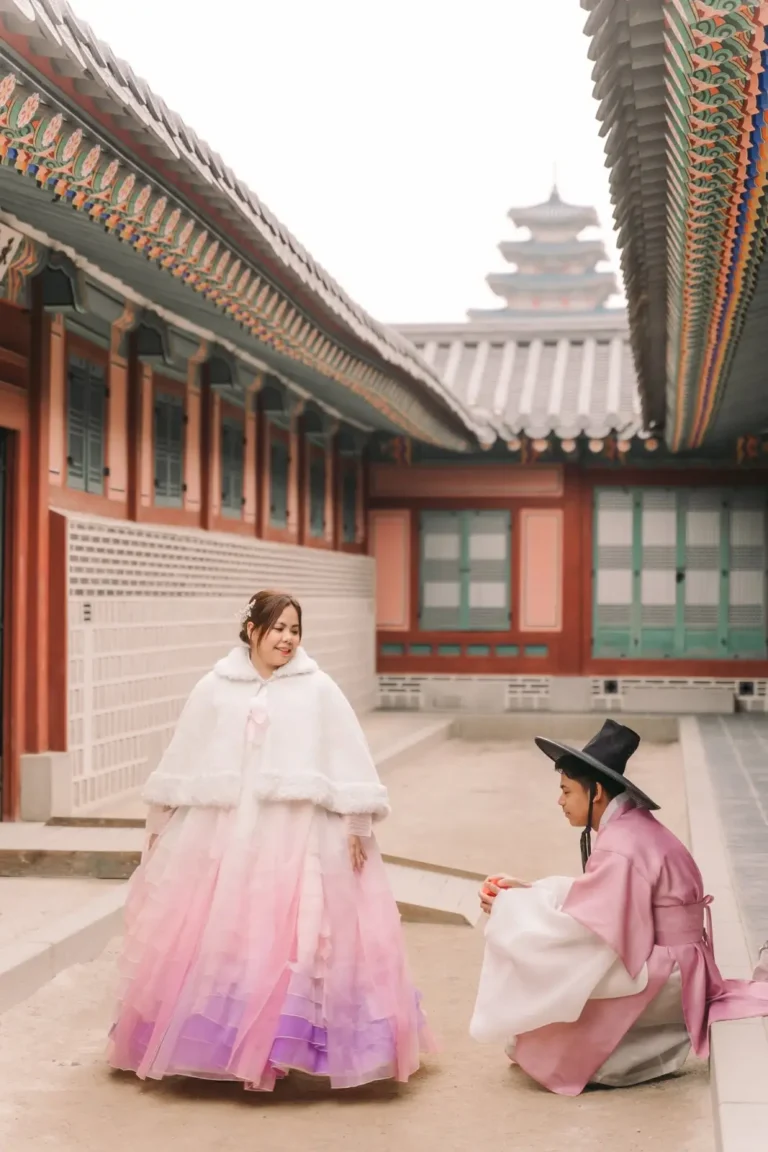 Romantic proposal in traditional hanbok at Gyeongbokgung Palace in Seoul