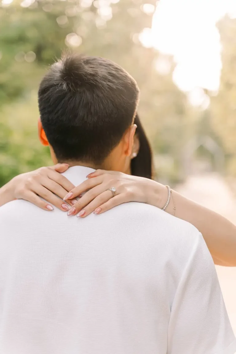 Close-up of a woman's engagement ring during a romantic couple photoshoot in Seoul