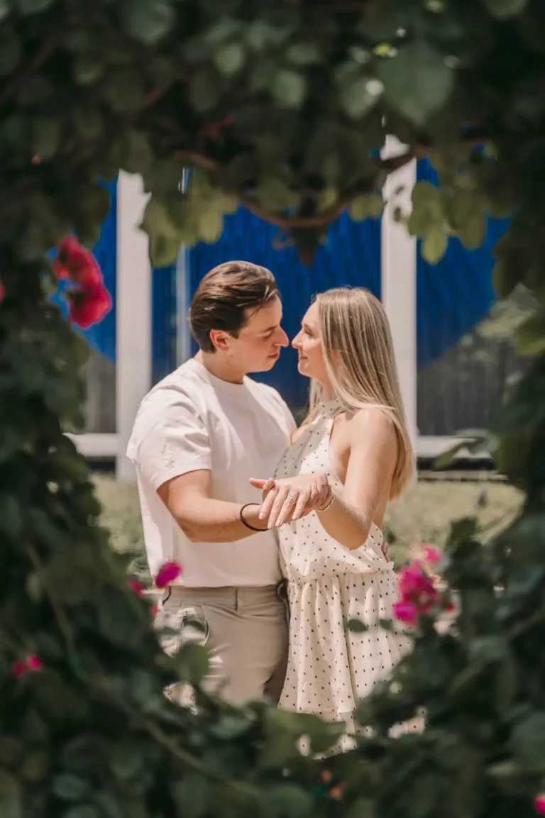 Newly engaged couple sharing a romantic moment during a Seoul garden photoshoot