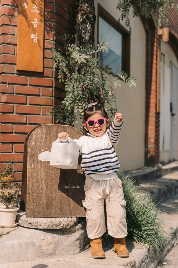 a photo of a girl in front of salt bread cafe in yeonnamdong