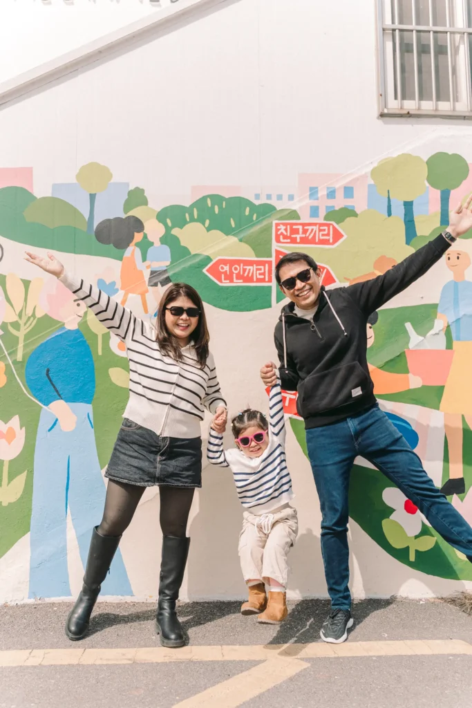 family photoshoot in yeonnamdong street holding hands
